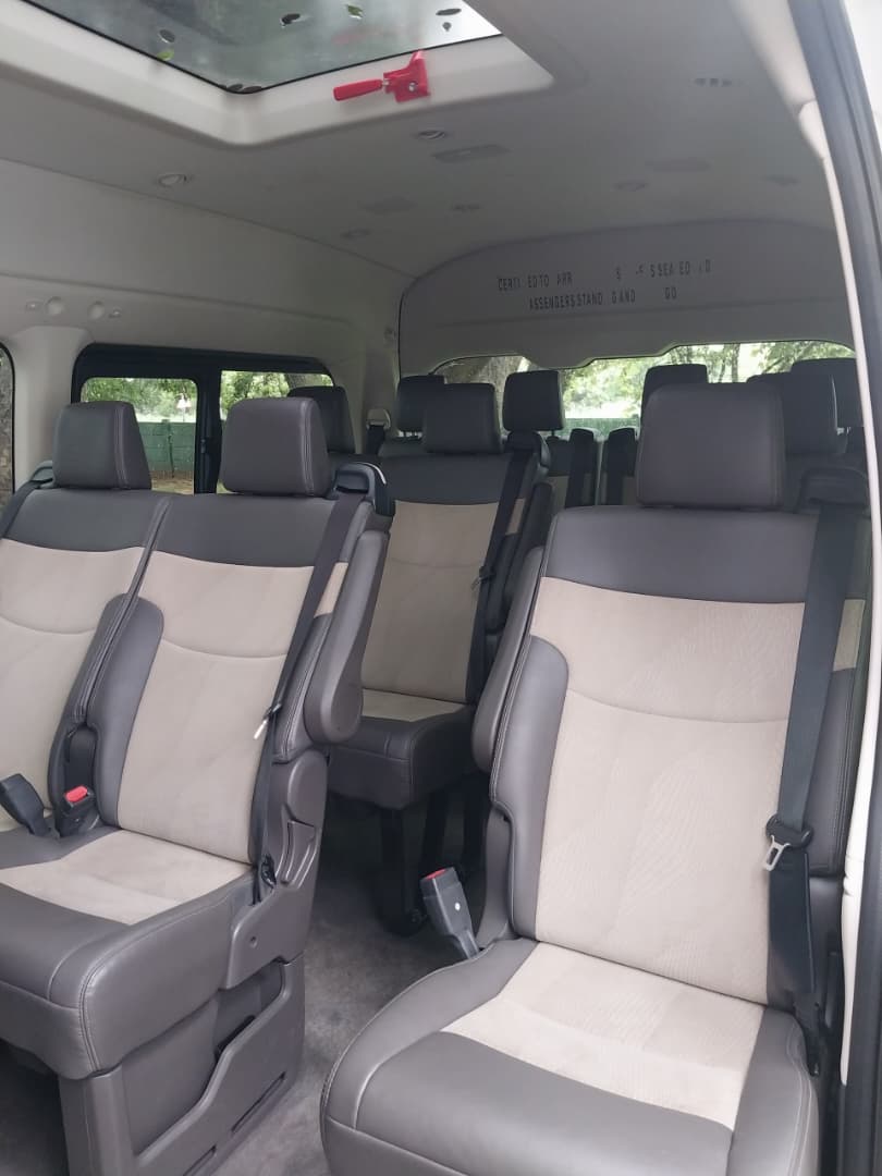 Clean passenger seating inside the transfer van